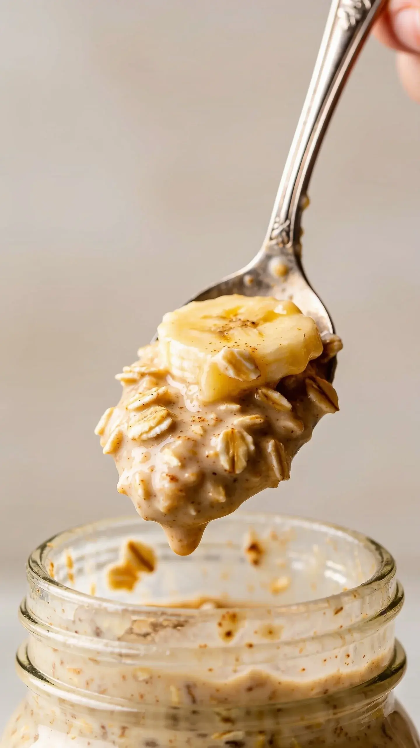 Spoonful of banana bread overnight oats above the jar