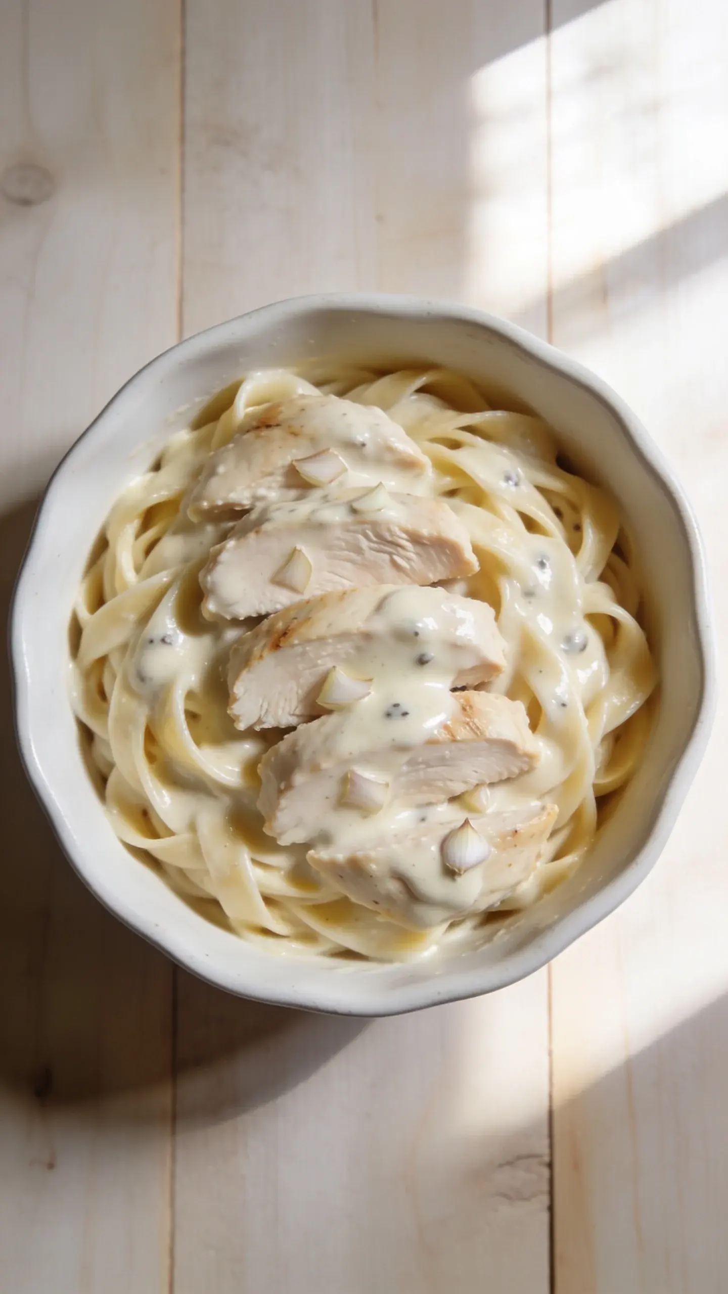 Bowl of creamy chicken Alfredo with fettuccine